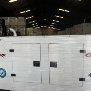 High-capacity industrial generator in warehouse setting.
